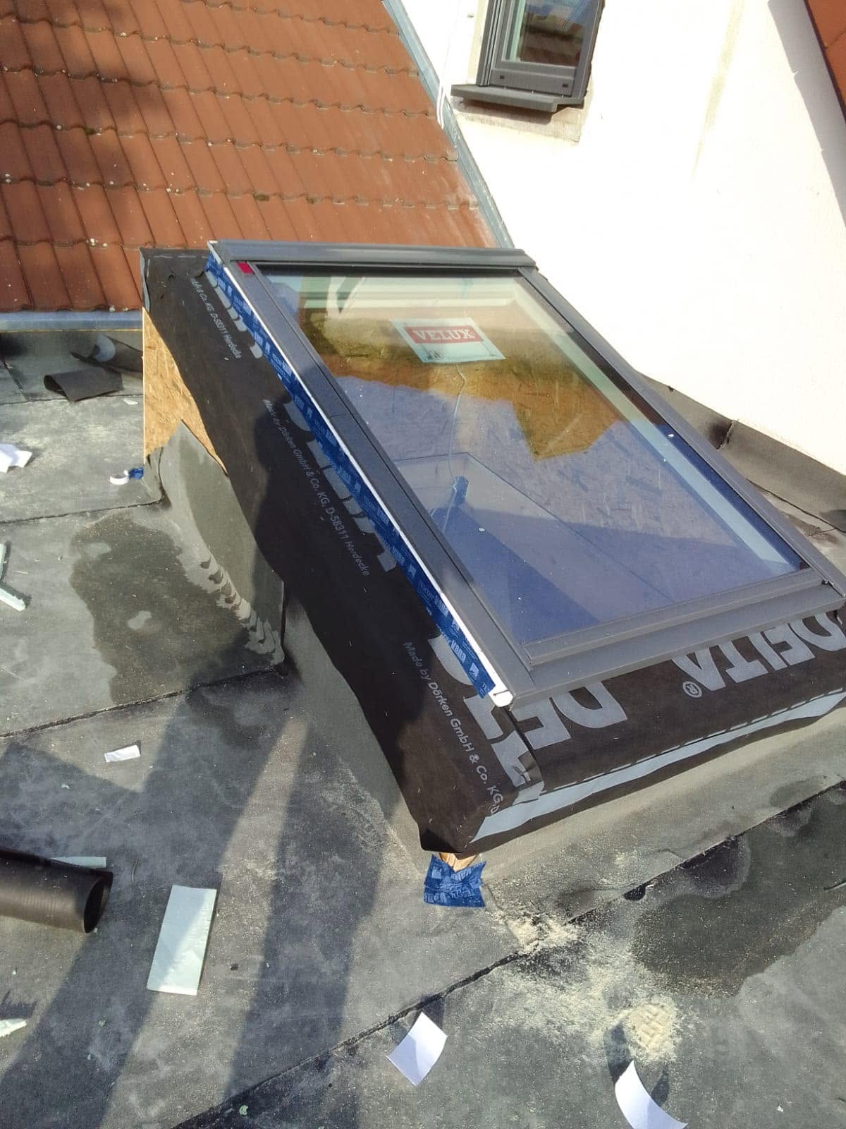 Flachdachfenster auf gezimmertem Aufsetzkranz